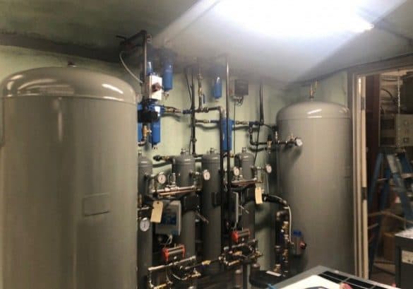 Skid-mounted instrument air compressor package