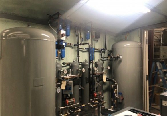 Skid-mounted instrument air compressor package